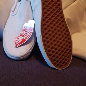 Vans checkerboard slip ons